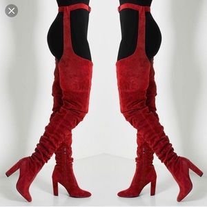 Thigh high belted boots